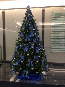Christmas tree in reception with blue decorations